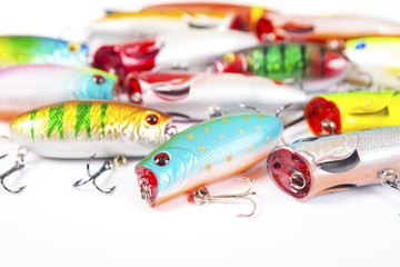 Set of fishing spinners and wobblers multi-colored background