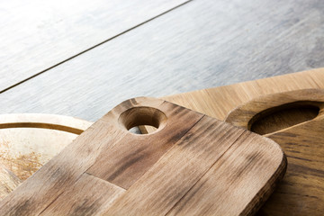 Cutting boards on wooden background
