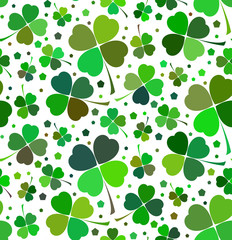 Obraz na płótnie Canvas Seamless floral pattern with lucky shamrock leaves in green and white colors. Vector illustration