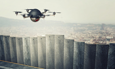 drone on border wall - obrazy, fototapety, plakaty