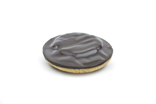 Single chocolate coated jaffa cake isolated on white background. Clipping path included in JPEG.