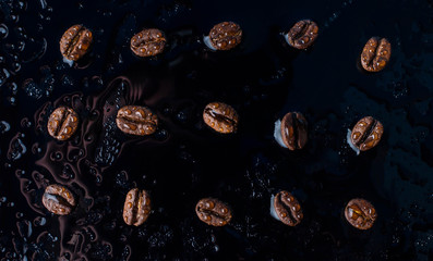 Coffee beans fresh water macro splash
