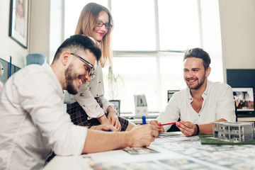 Fototapeta premium Confident team of engineers working together in a architect studio.