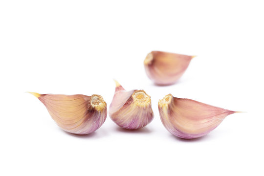 Healthy fresh garlic cloves isolated on white background