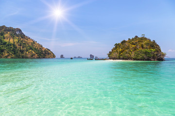 view of small tropical island with sunlight in the andaman sea at Thailand.
