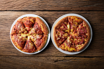 Delicious fresh pizza served on wooden table