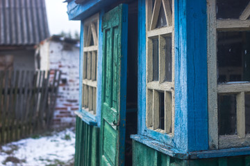 Abandoned old scaly houses near Chernobyl at spring
