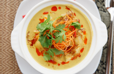 Bowl of  Tom Yam, spicy curry dish