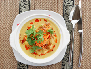 Bowl of  Tom Yam, spicy curry dish