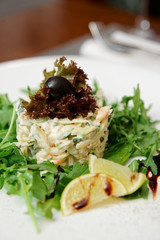 Seafood appetizer with rocket salad