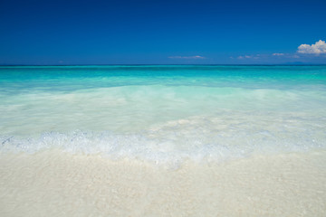 Fototapeta na wymiar White sand beach at ocean in Tropicana with clear sky 