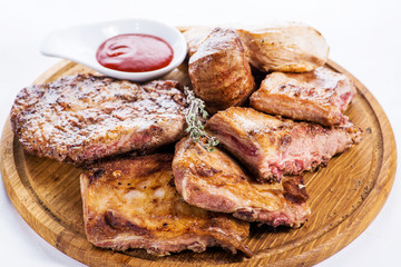 Set of meat on wooden board