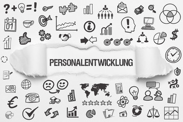Personalentwicklung / weißes Papier mit Symbole