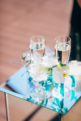 Luxury wine glasses with champagne, wedding decoration