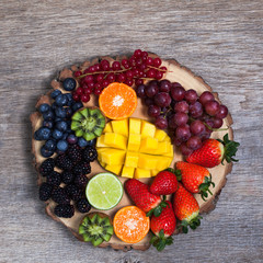 Raw fruit and berries platter, top view