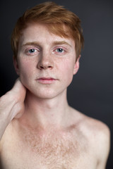 Obraz premium Portrait of red-haired handsome guy