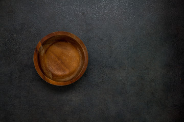A wooden bowl. Preparing for dinner. For your design.