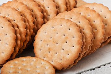 Tasty baked cookies on old wooden background.