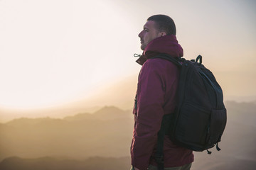 man on top of a mountain in the Sinai mountains in Egypt
