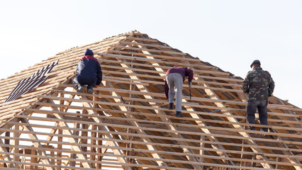 workers working on the roof