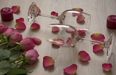 Glasses with rose petals.