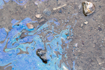 traces of gasoline on water