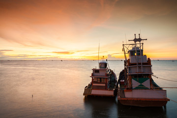 Fototapeta premium A twilight time after sunset on beach with boat