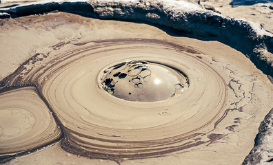 Fototapeta na wymiar Mud circles from Mud Volcanoes - Buzau, Romania