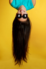 Beautiful girl with hair up in the air