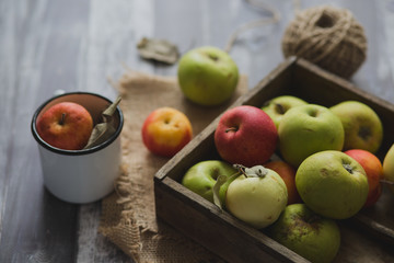 Apple on wooden board outdoors