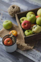 Apple on wooden board outdoors
