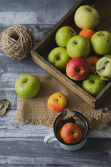Apple on wooden board outdoors