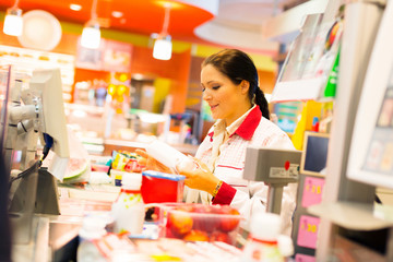 Sales Clerk In The Supermarket