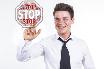 STOP - Young businessman touching word cloud