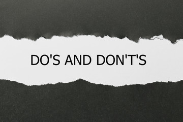 Do's and Don't's Message written under torn paper.