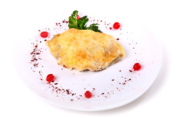 Fried meat covered with cheese and eggs