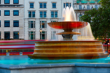 London Trafalgar Square fountain at sunset