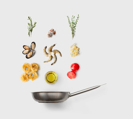 Cooking ingredients for italian food, seafood pasta, isolated on white