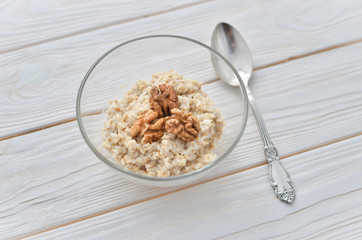Healthy eating right.  Oatmeal with walnuts