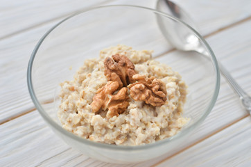 Healthy eating right.  Oatmeal with walnuts