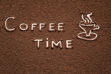 Drawn mug with inscription coffee time created from ground coffee in the kitchen. Enjoying a coffee break.