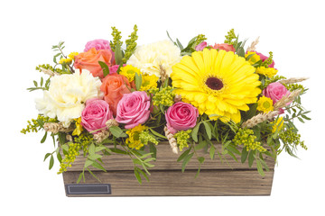 Bright buketny composition from fresh flowers, the white isolated background