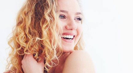 beautiful happy woman with curly hair