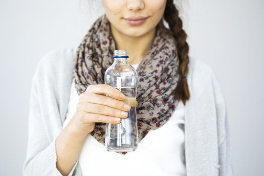 Young woman drinking water