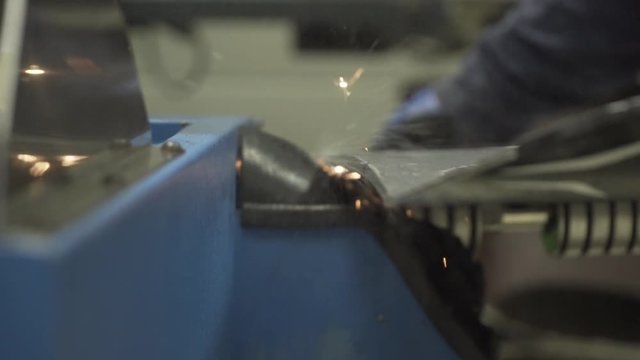 Snowboard service 5 - edge sharpening / tune with machine / slow motion scene