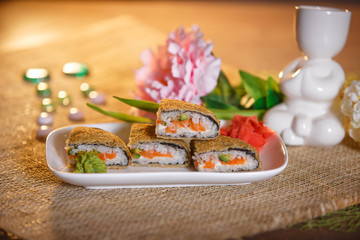 Warm roll with salmon, avocado and cream cheese