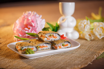 Warm roll with salmon, avocado and cream cheese