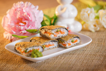 Warm roll with salmon, avocado and cream cheese
