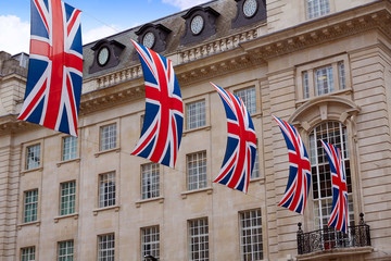 Fototapeta na wymiar London UK flags in Piccadilly Circus