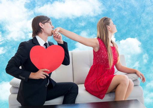 Man with red heart pleasing upset women